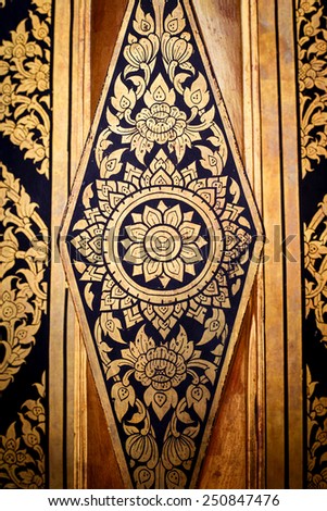 traditional Thai style art gold painting pattern on the door