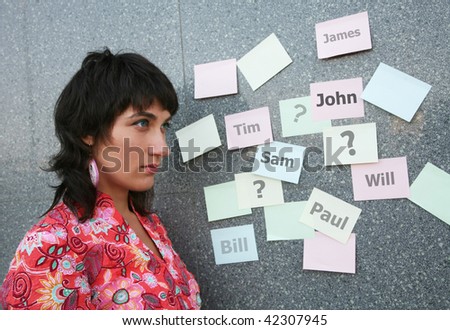 Young woman thinking of several men