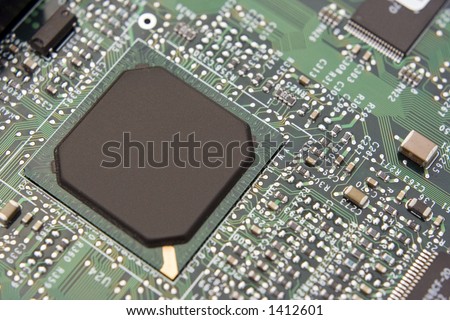 A shot of a new computer mother board.  This image is a nice background image for print material related to computer technology.