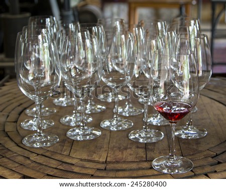 Wine glasses on wooden platter