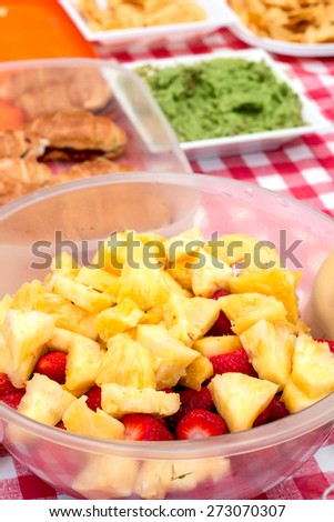 Pineapple Slices ans Strawberries in Party Table.