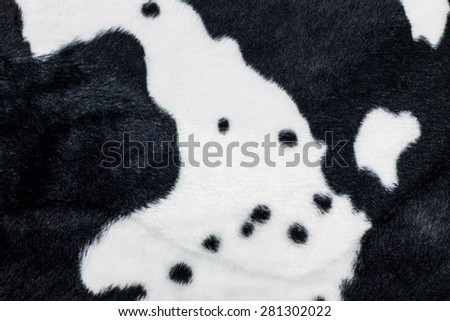 Texture of Cow Print Fabric.