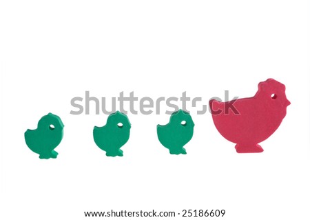 The toy chickens and hen on a white background