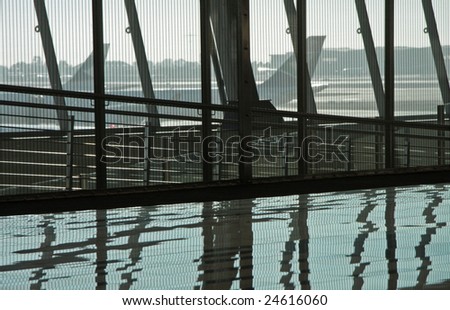 low angle shot of reflections on a shiny floor at an airport