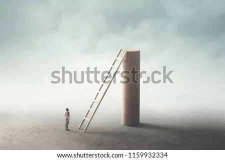 man rise stairs to reach the top of the tower