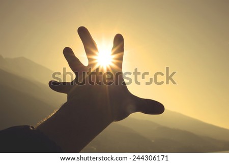 Trying to grab the sun