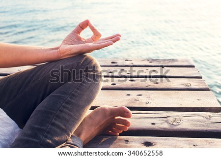 Peaceful woman finding body and mind balance