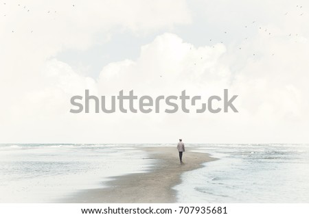 calm man walking in the sand between two seas