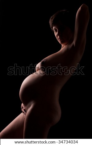 stock photo silhouette of naked pregnant woman