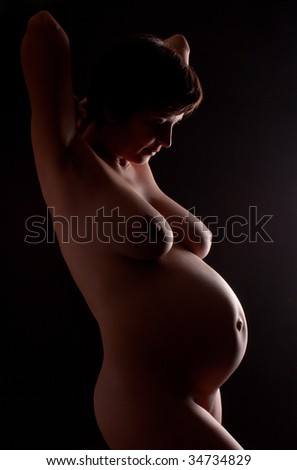 stock photo silhouette of naked pregnant woman