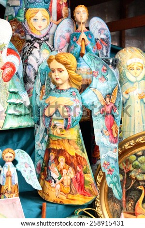 MOSCOW - MARCH 8, 2015: A free public art market on the pedestrian Arbat Street. Russians dolls. The angels.