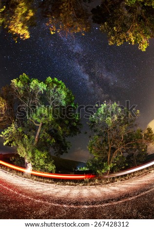 Milky Way. Beautiful summer night sky with stars, sea and rocks. Crimea mountains