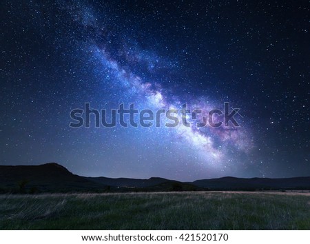 Landscape with blue Milky Way. Night sky with stars at mountains, Universe, beautiful mountain valley