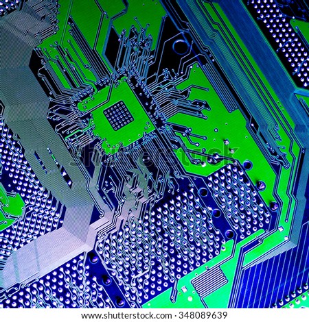 Circuit board. Electronic computer hardware technology. Motherboard digital chip. Tech science background. Integrated communication processor. Information engineering component. Blue, green color.