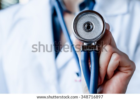 Medical stethoscope in hand, palm of a doctor cardiologist. Medicine, health hospital equipment for health care, treatment. Closeup diagnostic instrument, examination device for pulse