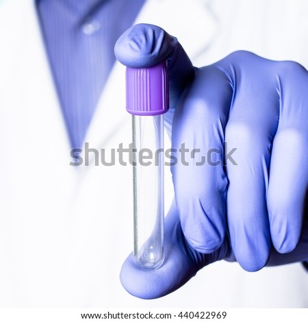 Test tubes in hand, palm, fingers for  science, scientific, chemical, chemistry research or experiment. Lab medical glass equipment, medicine, biology or biotechnology liquid. Scientist.