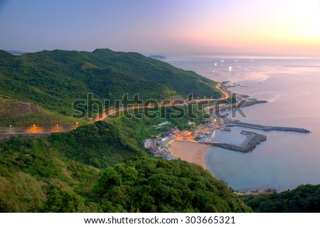 Aerial view of a fishing village at dawn on northern coast of Taipei Taiwan ~\
Coast Highway, Coastline and  a Fishing village at dawn ~
