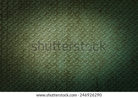 Green metal rhombus shaped texture closeup background