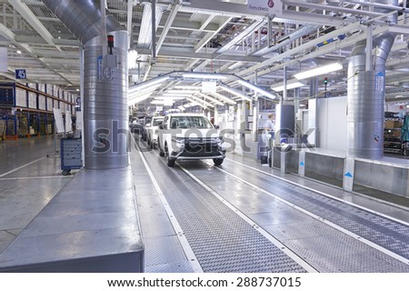 KALUZHSKY region, RUSSIA - JUNE 16: Almost finished car Mitsubishi Outlander is going pipeline at automotive Mitsubishi (PCMA) plant on june 16, 2015
