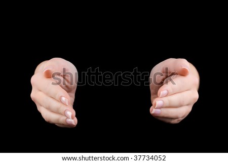 Hands joined together  isolated on black background