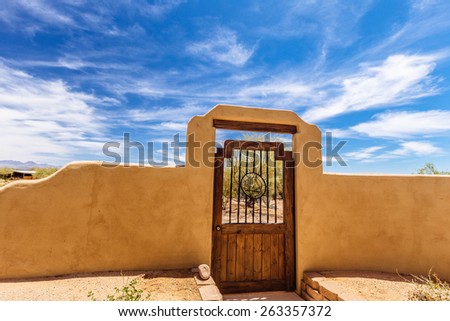 Home Entry Gate and Blue Sky in the Desert
