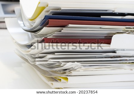 a lot of papers. office scene.