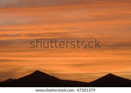 Sunset and mountain silhouette