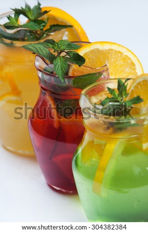 Three different cold drinks Fresh juice mix Three of fruit cocktails. Fruit cold tea cocktails.