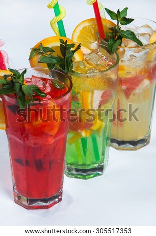 Three different cold drinks Fresh juice mix Three of fruit cocktails. Fruit cold tea cocktails on white background.