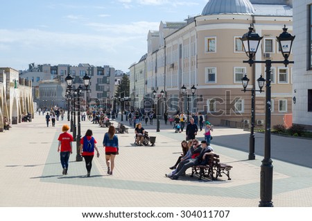 KAZAN, RUSSIA - MAY 1, 2015: Tourists and locals walking on the pedestrian Bauman street. Kazan, Republic of Tatarstan, Russia.