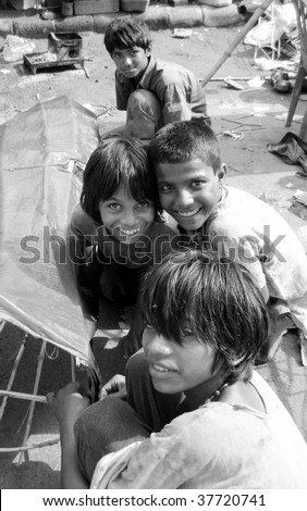 Slum village children laboring hard to earn one meal a day