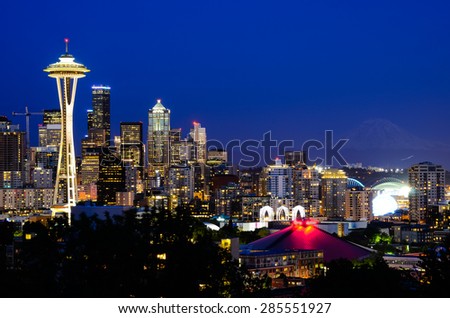 Seattle skylines in blue hour, the view from Kerry Park in Queen Anne Hill, Seattle, Washington State, USA. Mount Rainer can be seen from background.