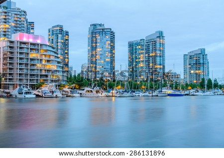 Vancouver BC Canada Skylines along False Creek at Night. Vancouver is the third most populous metropolitan area and is the most ethnically diverse cities in Canada.