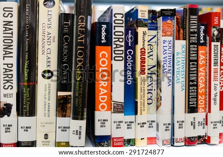 WASHINGTON, USA - JUNE 27 - A bookshelf of American travel books in King County Library System (KCLS). This is library system serving the residents of King County, Washington, United States.