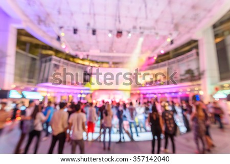 Defocus and abstract motion blur New Year live concert celebration in Singapore. Disco party light. Nightclub, nightlife, entertainment, showbiz and party concept. Bokeh live performance background