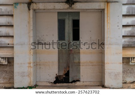 Old door seem like a warehouse or laboratory door