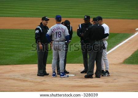 Baseball Teams Rangers vs Yankees and Umpires.