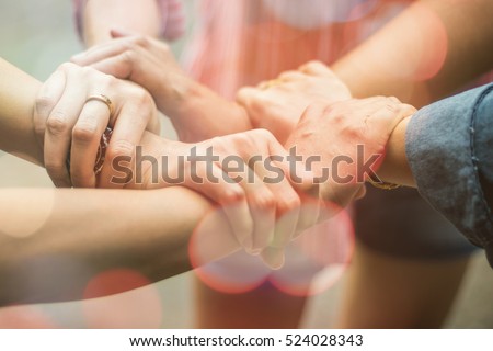 Double exposure of hands were a collaboration concept of teamwork and bokeh background