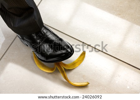 men shoe stepping on banana peel, top view. Look for more in MY PORTFOLIO