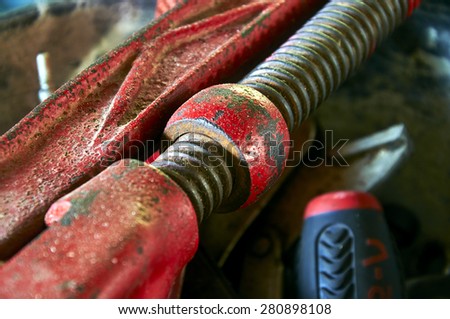 Part of large Red Plumbers Wrench