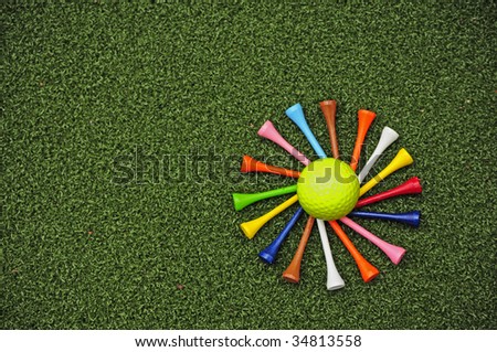 spiral of golf tees around golf ball