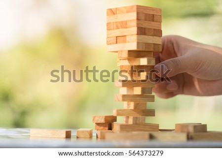 Wood blocks stack game using as background education concept.