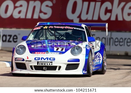 DETROIT - JUNE 2: A Porsche 911  at the 2012 Detroit Grand Prix on June 2, 2012 in Detroit, Michigan.