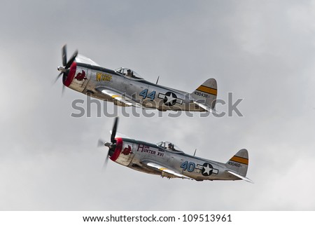 YPSILANTI - AUGUST 4 : A pair of (-47 Thunderbolts make a pass at the Thunder over Michigan air show  August 4, 2012 in Ypsilanti, Michigan.