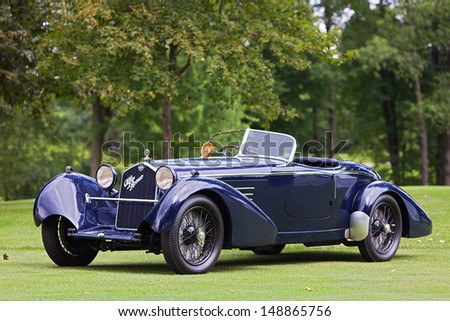 PLYMOUTH - JULY 28: A 1934 Alfa Romeo 8c 2300 Boat Tail Speedster owned by Roger Willbanks wins the Best of Show European Class at the 2013 Concours D\'Elegance  July 28, 2013 Plymouth, Michigan.