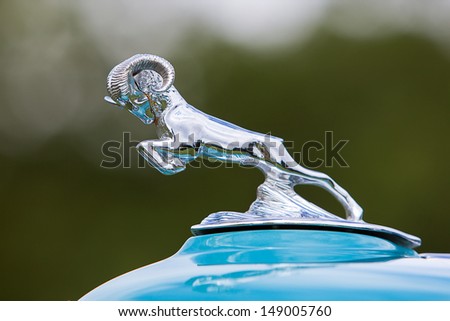 PLYMOUTH - JULY 28: A vintage Dodge hood ornament at the 2013 Concours D\'Elegance  July 28, 2013 Plymouth, Michigan.