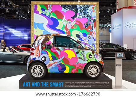 CHICAGO - FEBRUARY 6 : A Smart car wrapped in graffiti artwork by Miguel Paredes on display at the Chicago Auto Show media preview February 6, 2014 in Chicago, Illinois.