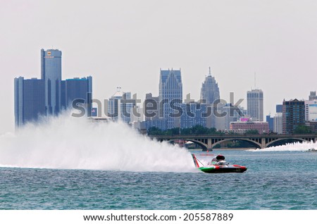 DETROIT - JULY 12: The Oberto hydroplane races in front of the Detroit skyline at the APBA Gold Cup July 12, 2014 on the Detroit River in Detroit, Michigan.