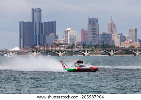 DETROIT - JULY 13: The Oberto hydroplane races in front of the Detroit skyline at the APBA Gold Cup July 13, 2014 on the Detroit River in Detroit, Michigan.