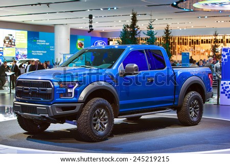 DETROIT - JANUARY 12: Ford debuts the new Raptor pickup truck January 12th, 2015 at the 2015 North American International Auto Show in Detroit, Michigan.